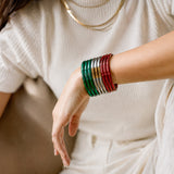 Bundle México 2026 con nueve bangles en colores rojo, plata y verde, inspirados en la pasión del fútbol y los colores emblemáticos de México.