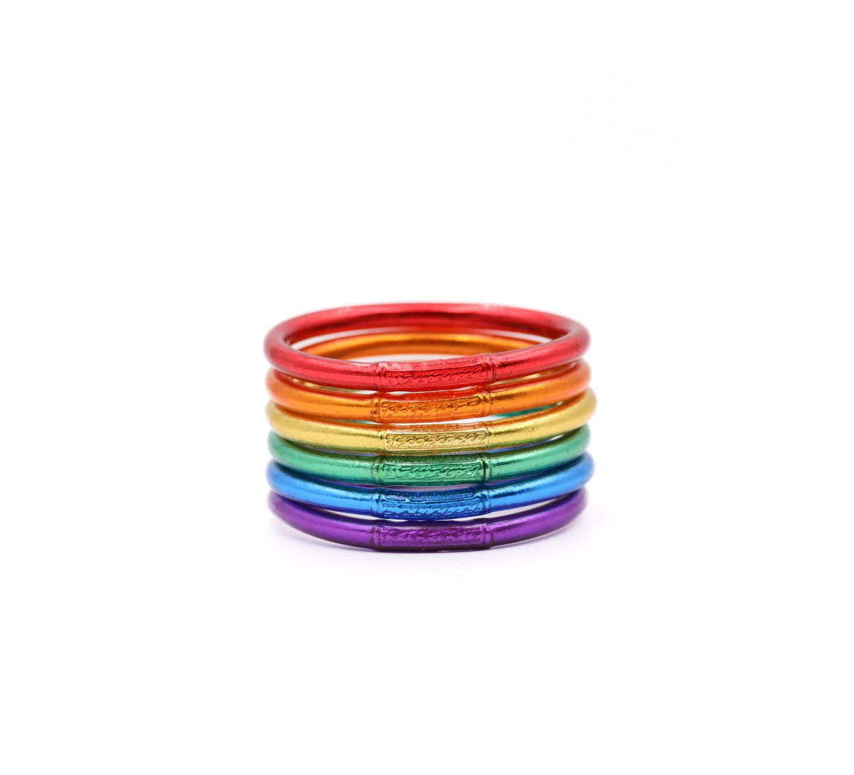 Set de 6 pulseras Pride MANIKĀ en colores del arcoíris, hoja de oro de 22 kilates encapsulada en silicón
